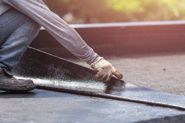 Professional Basement Waterproofing technician working in Toney, AL